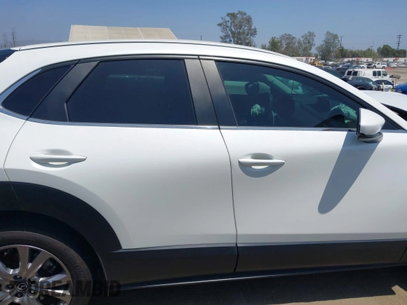 2021 Mazda CX-30 Select with VIN 3MVDMBBL9MM313039, listed as a IAAI auction lot 42575424 with 21,083 mi miles and . Bid and sale history available at DreamBid. Image 13.