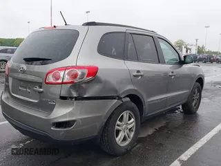 2011 Hyundai Santa Fe GLS z VIN 5XYZGDAB1BG027604, wystawiony jako IAAI lot #42219358 z przebiegiem 145 948 mil mil oraz . Historia ofert i sprzedaży dostępna na DreamBid. Obrazek 4.