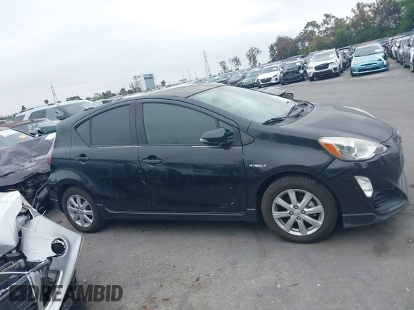 2017 Toyota Prius One with VIN JTDKDTB32H1597017, listed as a IAAI auction lot 42030182 with 56,461 mi miles and . Bid and sale history available at carsss.com. Image 13.