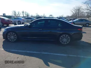 2018 BMW 5 Series M550i xDrive with VIN WBAJB9C55JB049529, listed as a IAAI auction lot 41241917 with 116,265 mi miles and . Bid and sale history available at carsss.com. Image 14.