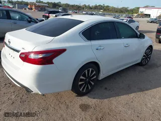 2018 Nissan Altima 2.5 SV with VIN 1N4AL3AP7JC235011, listed as a IAAI auction lot 41737494 with 76,330 mi miles. Bid and sale history available at carsss.com. Image 4.