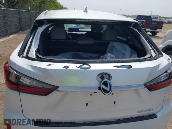 2019 Lexus RX 350 z VIN 2T2ZZMCA4KC126214, wystawiony jako IAAI lot #41881877 z przebiegiem 91 419 mil mil oraz . Historia ofert i sprzedaży dostępna na DreamBid. Obrazek 6.