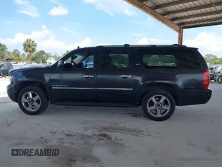 2011 Chevrolet Suburban LTZ with VIN 1GNSKKE3XBR180241, listed as a IAAI auction lot 42365771 with 231,477 mi miles and . Bid and sale history available at DreamBid. Image 14.