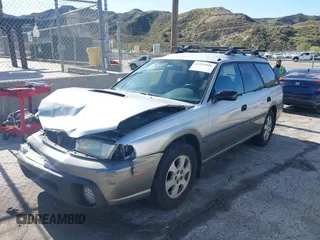 1999 Subaru Legacy Outback z VIN 4S3BG6850X6621723, wystawiony jako IAAI lot #41932992 z przebiegiem 283 200 mil mil oraz . Historia ofert i sprzedaży dostępna na DreamBid. Obrazek 2.