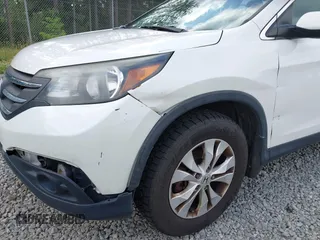 2012 Honda CR-V EX-L with VIN 5J6RM4H75CL081031, listed as a IAAI auction lot 42353331 with 203,769 mi miles and . Bid and sale history available at DreamBid. Image 6.