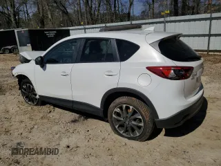 2016 Mazda CX-5 Grand Touring with VIN JM3KE4DY6G0857197, listed as a Copart auction lot 44500955 with 76,088 mi miles and Salvage Title. Bid and sale history available at DreamBid. Image 2.
