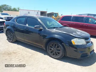 2014 Dodge Avenger SE with VIN 1C3CDZAB1EN133550, listed as a IAAI auction lot 42033001 with 137,592 mi miles. Bid and sale history available at carsss.com. Image 1.