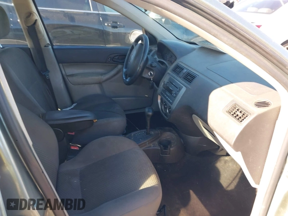 2006 Ford Focus S z VIN 1FAFP37N16W164037, wystawiony jako IAAI lot #41035779 z przebiegiem 251 770 mil mil oraz . Historia ofert i sprzedaży dostępna na DreamBid. Obrazek 5.