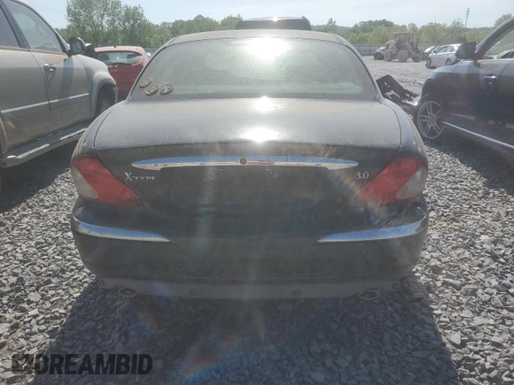 2002 Jaguar X-Type z VIN SAJEA51C02WC53526, wystawiony jako Copart lot #53761265 z przebiegiem 156 584 mil mil oraz Czysty tytuł • Clean title. Historia ofert i sprzedaży dostępna na DreamBid. Obrazek 6.