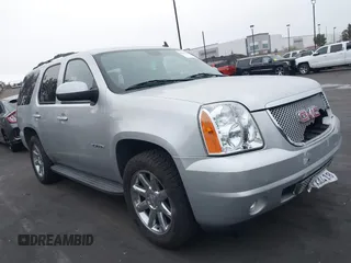 2013 GMC Yukon SLT with VIN 1GKS1CE07DR157076, listed as a IAAI auction lot 41557228 with 148,242 mi miles. Bid and sale history available at carsss.com. Image 14.