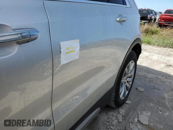 2019 Cadillac XT4 FWD Premium Luxury z VIN 1GYFZCR42KF147440, wystawiony jako Copart lot #45549835 z przebiegiem Nie podano mil oraz Szkody całkowita. Historia ofert i sprzedaży dostępna na DreamBid. Obrazek 13.
