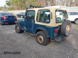 1995 Jeep Wrangler S with VIN 1J4FY19P5SP243137, listed as a IAAI auction lot 41787400 with 136,565 mi miles. Bid and sale history available at carsss.com. Image 3.