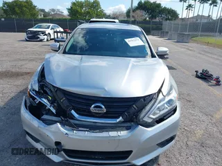 2016 Nissan Altima SR with VIN 1N4AL3AP3GC109477, listed as a IAAI auction lot 41512271 with 47,592 mi miles and . Bid and sale history available at DreamBid. Image 12.