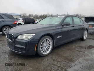 2015 BMW 7 Series 750Li xDrive with VIN WBAYF8C50FD654079, listed as a Copart auction lot 51569455 with 112,640 mi miles and Salvage Title. Bid and sale history available at carsss.com. Image 1.