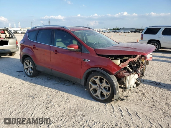 2017 Ford Escape Titanium with VIN 1FMCU0J97HUD52930, listed as a Copart auction lot 71851014 with 101,467 mi miles and Salvage Title. Bid and sale history available at carsss.com. Image 4.
