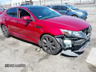 2012 Kia Optima SX z VIN 5XXGR4A60CG086945, wystawiony jako IAAI lot #41999256 z przebiegiem 167 059 mil mil oraz . Historia ofert i sprzedaży dostępna na DreamBid. Obrazek 1.