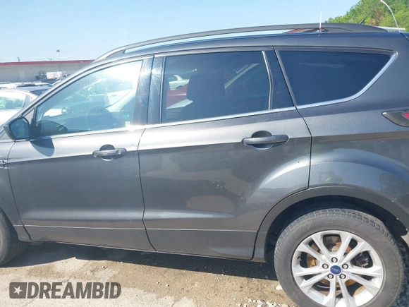 2017 Ford Escape SE with VIN 1FMCU0GD7HUA38402, listed as a IAAI auction lot 41964197 with 205,577 mi miles. Bid and sale history available at carsss.com. Image 14.