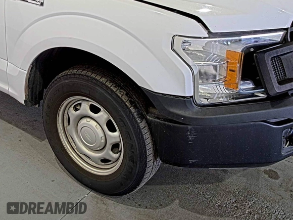 2019 Ford F-150 XL with VIN 1FTMF1CB3KKC98828, listed as a IAAI auction lot 42332499 with 120,504 mi miles and . Bid and sale history available at DreamBid. Image 1.