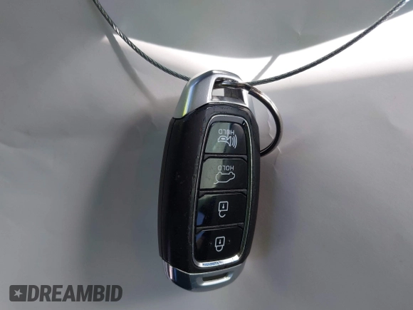2019 Hyundai Santa Fe SEL z VIN 5NMS3CADXKH071437, wystawiony jako IAAI lot #41752902 z przebiegiem 66 980 mil mil oraz . Historia ofert i sprzedaży dostępna na DreamBid. Obrazek 11.