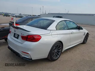 2018 BMW M4 with VIN WBS4Z9C55JED30963, listed as a IAAI auction lot 41641751 with 34,543 mi miles and . Bid and sale history available at DreamBid. Image 4.