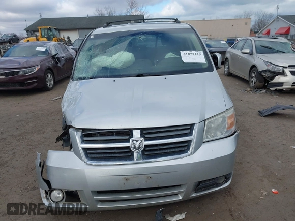 2010 Dodge Grand Caravan SXT with VIN 2D4RN5D13AR180609, listed as a IAAI auction lot 41857215 with Not Provided miles and . Bid and sale history available at DreamBid. Image 12.