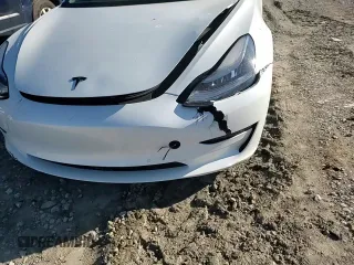 2021 Tesla Model 3 Standard Range Plus with VIN 5YJ3E1EA8MF852089, listed as a Copart auction lot 46157845 with 82,979 mi miles and Salvage Title. Bid and sale history available at DreamBid. Image 10.
