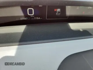 2022 Toyota Prius LE z VIN JTDKAMFP9N3208904, wystawiony jako Copart lot #62521205 z przebiegiem 37 147 mil mil oraz Szkoda całkowita • Salvage title. Historia ofert i sprzedaży dostępna na DreamBid. Obrazek 9.