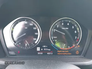 2019 BMW X1 sDrive28i with VIN WBXHU7C59K5L12320, listed as a IAAI auction lot 42116860 with 28,183 mi miles and . Bid and sale history available at DreamBid. Image 7.
