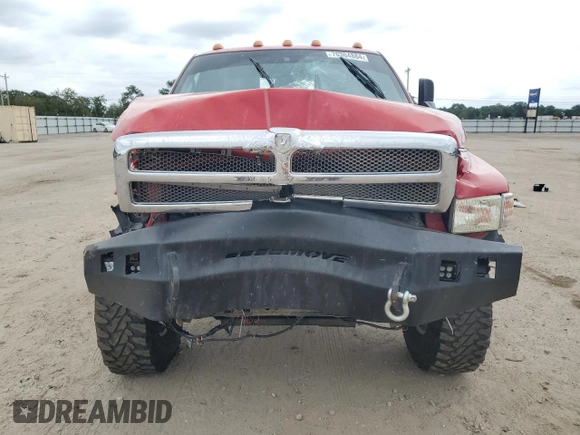 2000 Dodge 2500 with VIN 1B7KF236XYJ100955, listed as a Copart auction lot 70304884 with 250,592 mi miles and Salvage title. Bid and sale history available at DreamBid. Image 5.