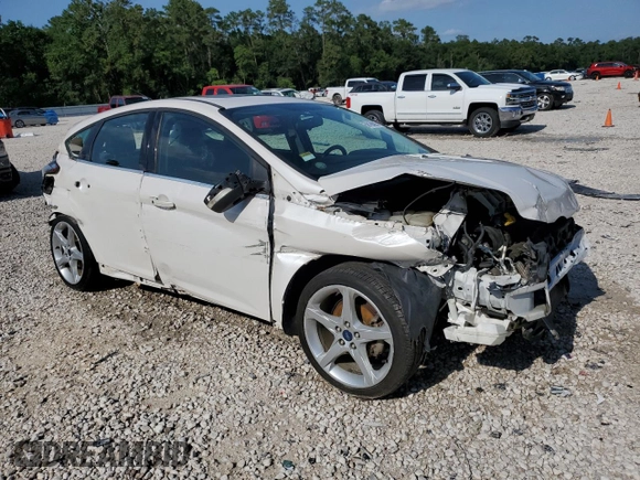 2014 Ford Focus Titanium z VIN 1FADP3N27EL161613, wystawiony jako Copart lot #56166805 z przebiegiem 140 336 mil mil oraz Szkoda całkowita • Salvage title. Historia ofert i sprzedaży dostępna na DreamBid. Obrazek 4.