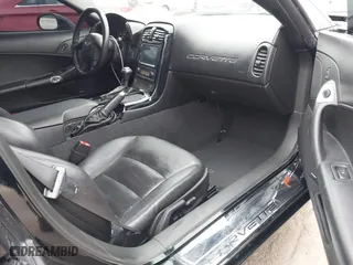2005 Chevrolet Corvette with VIN 1G1YY24U155119523, listed as a IAAI auction lot 41870761 with 103,986 mi miles. Bid and sale history available at carsss.com. Image 5.