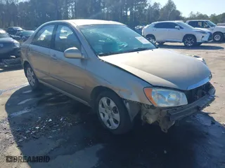 2004 Kia Spectra LX with VIN KNAFE121745039519, listed as a IAAI auction lot 41482402 with 201,123 mi miles. Bid and sale history available at carsss.com. Image 1.