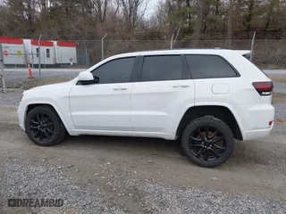 2018 Jeep Grand Cherokee Laredo E with VIN 1C4RJFAG6JC152867, listed as a IAAI auction lot 41486884 with 67,115 mi miles. Bid and sale history available at carsss.com. Image 14.