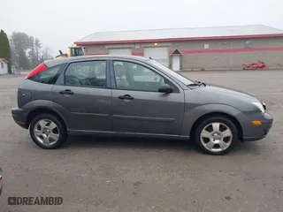 2006 Ford Focus S with VIN 1FAFP37N26W180795, listed as a IAAI auction lot 42100395 with 125,002 mi miles. Bid and sale history available at carsss.com. Image 14.