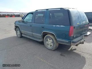 1995 Chevrolet Tahoe with VIN 1GNEK13K7SJ396709, listed as a IAAI auction lot 41776923 with 183,877 mi miles. Bid and sale history available at carsss.com. Image 3.
