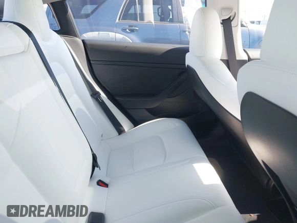 2023 Tesla Model 3 Long Range z VIN 5YJ3E1EB7PF704061, wystawiony jako IAAI lot #42079045 z przebiegiem 4 012 mil mil oraz . Historia ofert i sprzedaży dostępna na DreamBid. Obrazek 8.