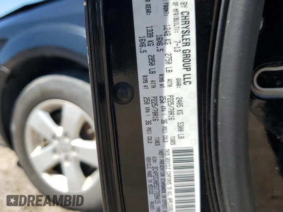 2013 Dodge Journey SE with VIN 3C4PDCAB5DT729415, listed as a Copart auction lot 55851915 with 128,782 mi miles and Salvage title. Bid and sale history available at DreamBid. Image 13.
