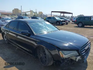 2012 Audi A8 z VIN WAURVAFDXCN034380, wystawiony jako IAAI lot #39679823 z przebiegiem 74 441 mil mil oraz . Historia ofert i sprzedaży dostępna na DreamBid. Obrazek 1.