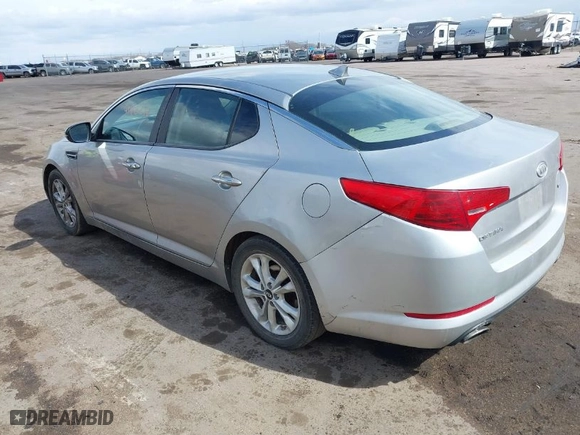 2011 Kia Optima EX with VIN KNAGN4A70B5076758, listed as a IAAI auction lot 41822218 with 161,183 mi miles. Bid and sale history available at carsss.com. Image 3.