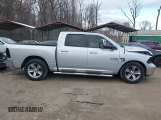 2014 Ram 1500 Big Horn with VIN 1C6RR7LM1ES370977, listed as a IAAI auction lot 41037510 with 145,692 mi miles and . Bid and sale history available at DreamBid. Image 13.