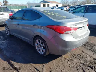 2012 Hyundai Elantra GLS PZEV with VIN KMHDH4AEXCU351759, listed as a IAAI auction lot 41679662 with 999,999 mi miles. Bid and sale history available at carsss.com. Image 3.