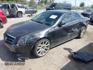 2011 Cadillac CTS Sedan Luxury with VIN 1G6DH5EY8B0116879, listed as a IAAI auction lot 41708842 with 124,550 mi miles. Bid and sale history available at carsss.com. Image 17.
