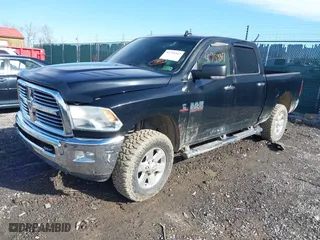 2014 Ram 2500 SLT with VIN 3C6UR5DLXEG280609, listed as a IAAI auction lot 41753347 with 167,000 mi miles. Bid and sale history available at carsss.com. Image 2.