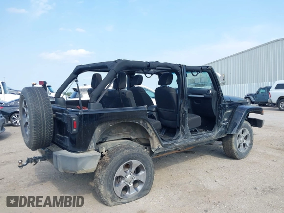 2016 Jeep Wrangler Unlimited Sahara with VIN 1C4BJWEG8GL333876, listed as a IAAI auction lot 42314351 with 163,889 mi miles and . Bid and sale history available at DreamBid. Image 4.