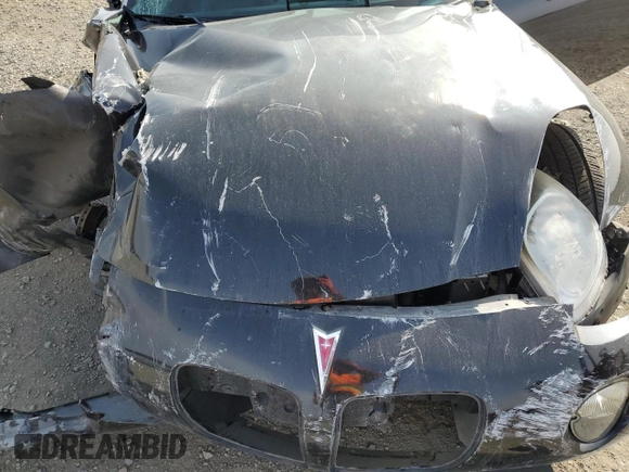 2007 Pontiac Solstice z VIN 1G2MB35B97Y117728, wystawiony jako Copart lot #87267724 z przebiegiem Nie podano mil oraz Szkoda całkowita • Salvage title. Historia ofert i sprzedaży dostępna na DreamBid. Obrazek 12.