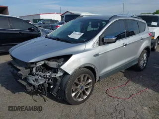 2016 Ford Escape SE with VIN 1FMCU0GX1GUB29903, listed as a IAAI auction lot 42066559 with 156,689 mi miles and . Bid and sale history available at carsss.com. Image 2.