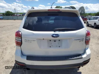 2015 Subaru Forester XT Touring with VIN JF2SJGUC4FH452824, listed as a Copart auction lot 56219615 with 127,328 mi miles and Salvage title. Bid and sale history available at DreamBid. Image 6.