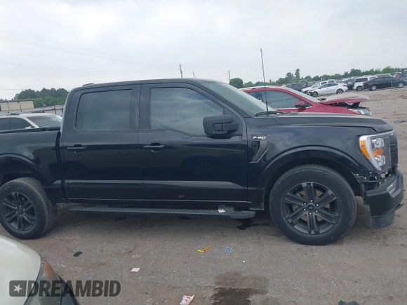 2021 Ford F-150 XL with VIN 1FTEW1C5XMFC46476, listed as a IAAI auction lot 42274855 with 89,148 mi miles and . Bid and sale history available at DreamBid. Image 13.