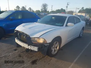 2014 Dodge Charger SE with VIN 2C3CDXBG7EH322291, listed as a IAAI auction lot 41925215 with 169,236 mi miles and . Bid and sale history available at carsss.com. Image 19.