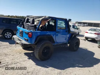 2011 Jeep Wrangler Rubicon with VIN 1J4BA6D15BL563410, listed as a Copart auction lot 76973964 with 68,334 mi miles and Salvage title. Bid and sale history available at DreamBid. Image 3.